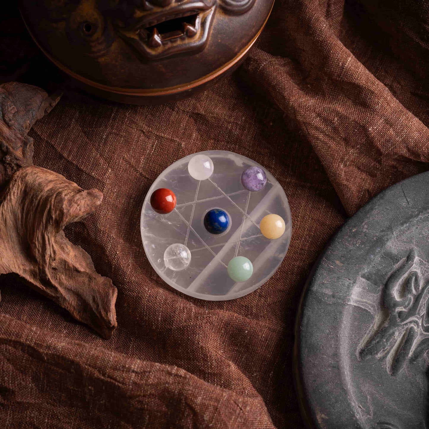 Close-up of polished chakra healing stones with vibrant colors.