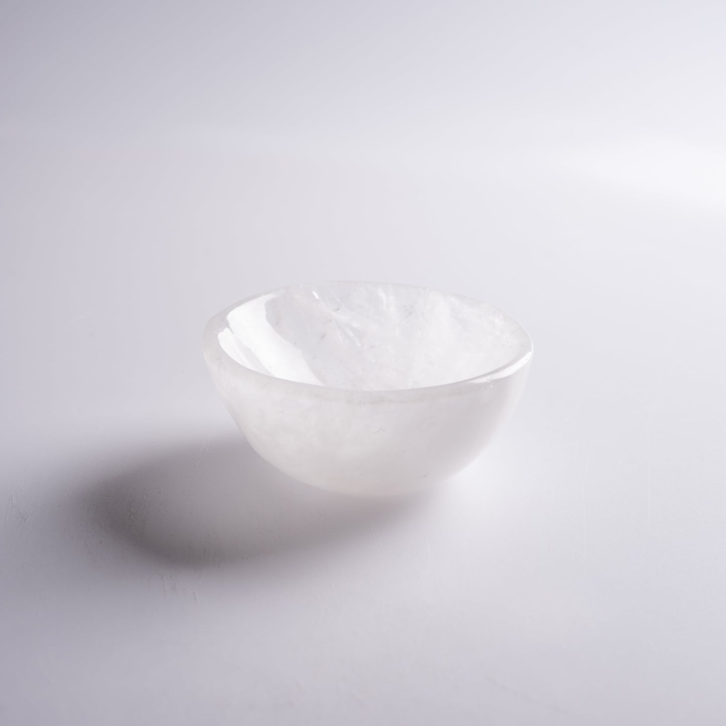 Charging crystal bowl for cleansing and energizing stones, perfect for meditation.