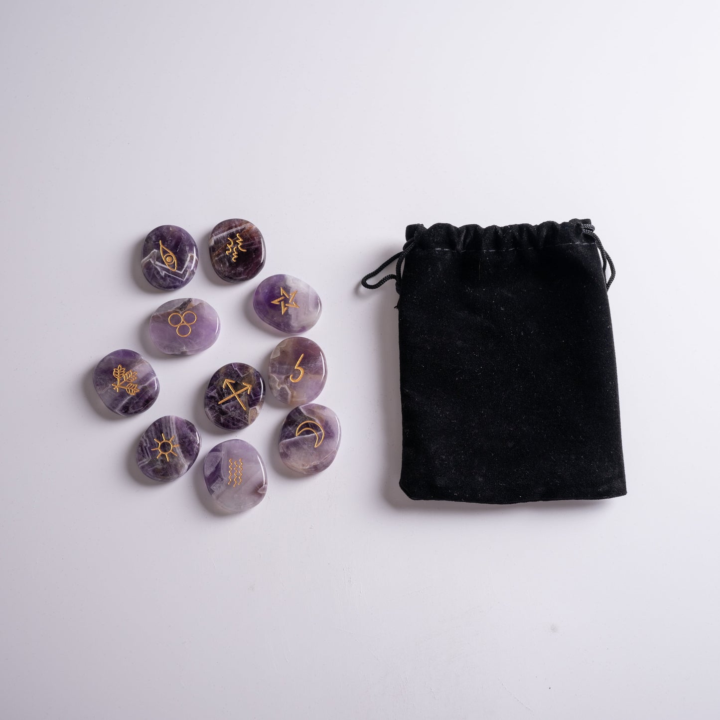 Side view of the crystal of destiny runes of magic, polished and unique in shape.
