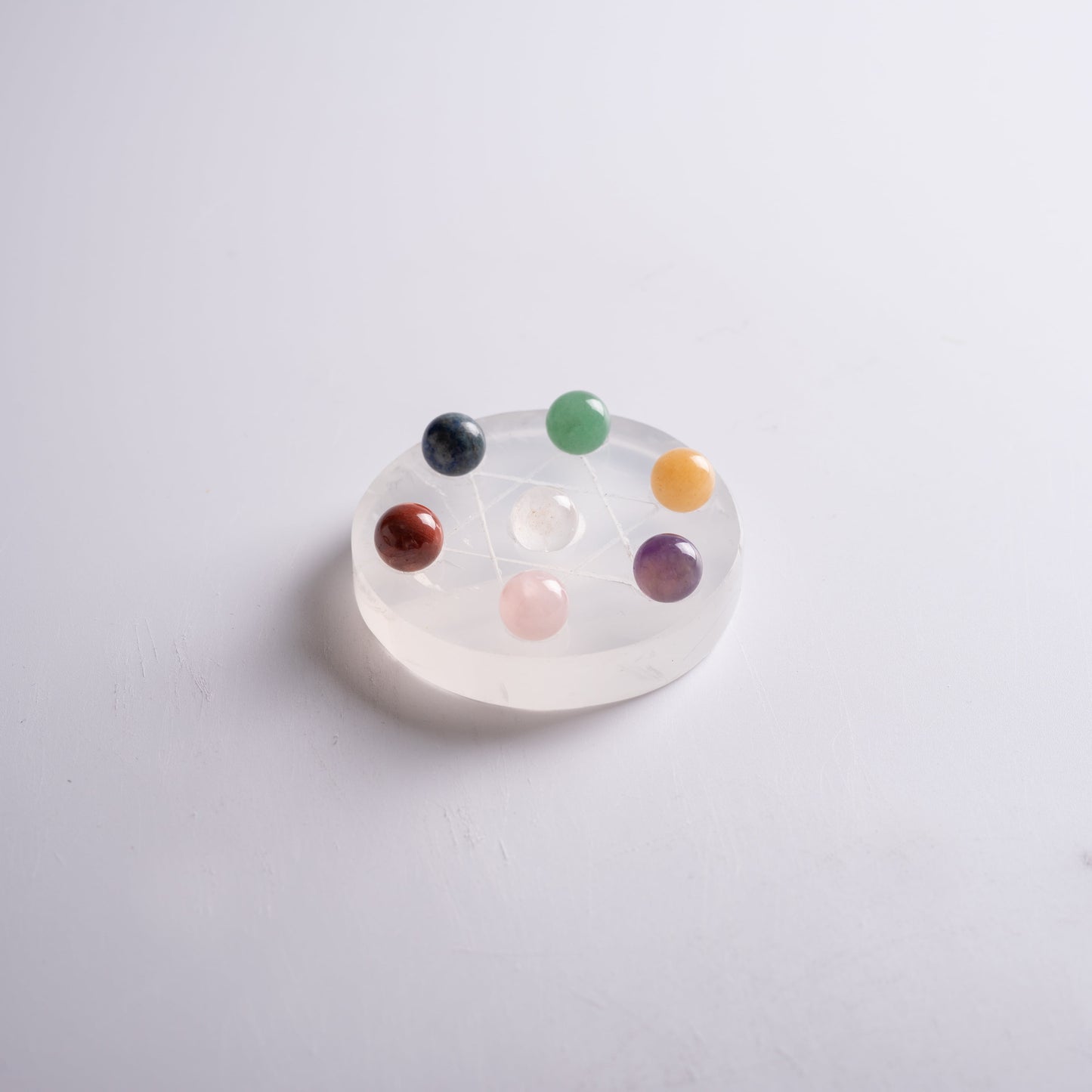 Healing crystal set arranged for meditation and energy healing.