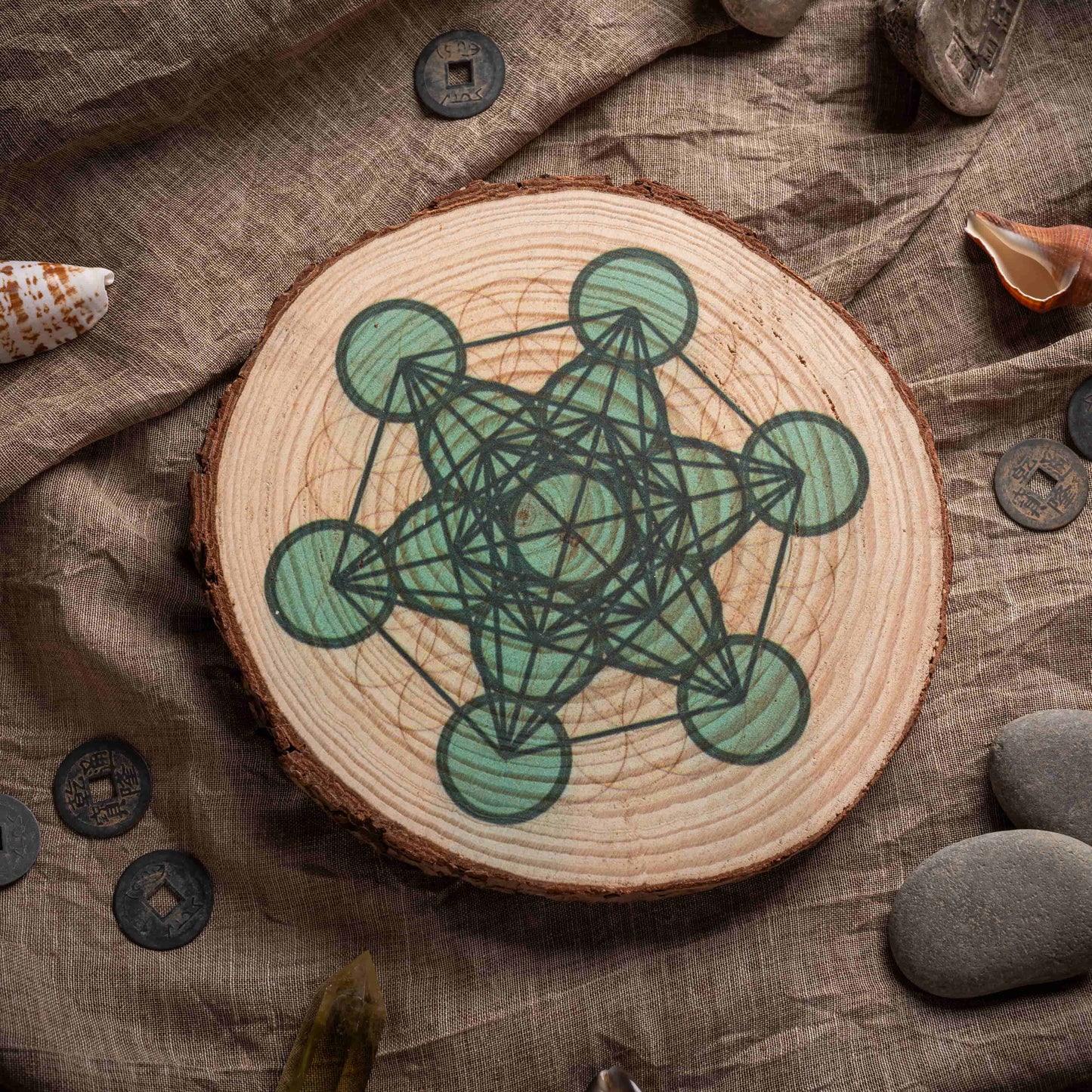 Close-up of sacred geometry crystal grid showing intricate laser engraving.