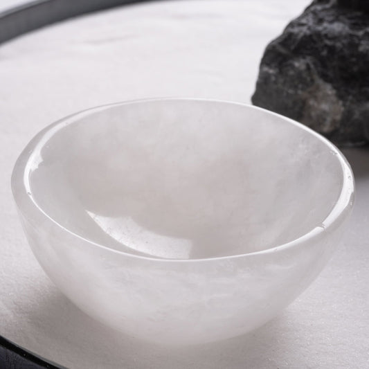 Close-up of selenite crystal bowl showing polished surface and sacred energy.