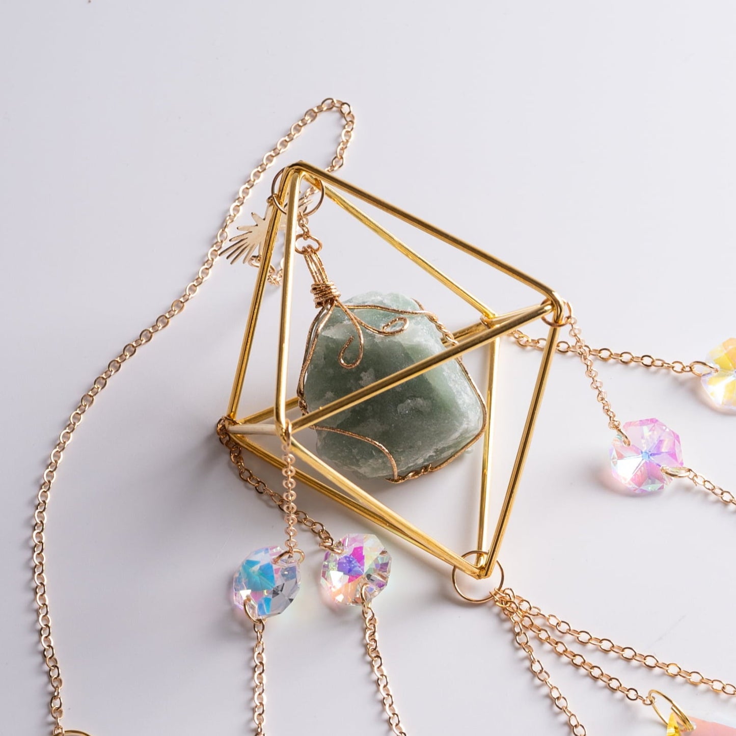 Sun catcher gift in elegant packaging, perfect for spiritual and decorative use.