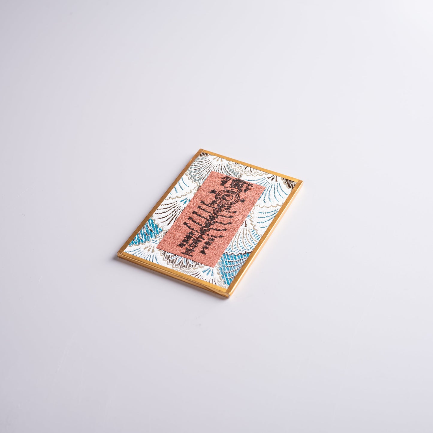 Talisman or lucky charm hanging in sacred space to invite blessings and harmony.