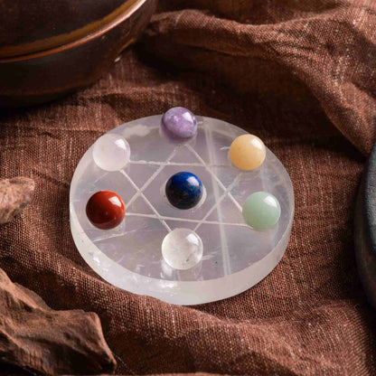 7 chakra stones set with hexagram stand for healing and energy balance.