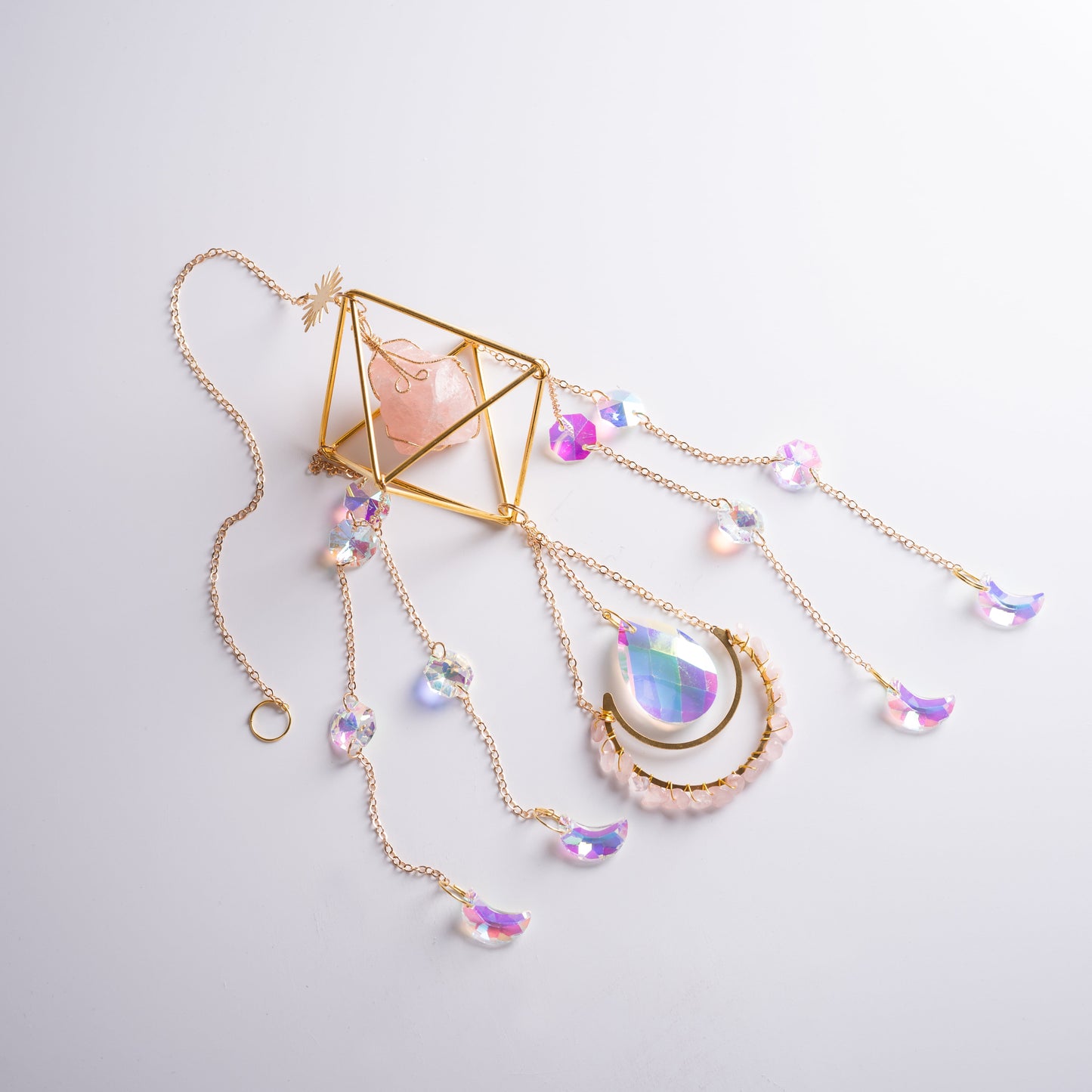 Hanging crystal suncatcher in meditation corner radiating joy and harmony.