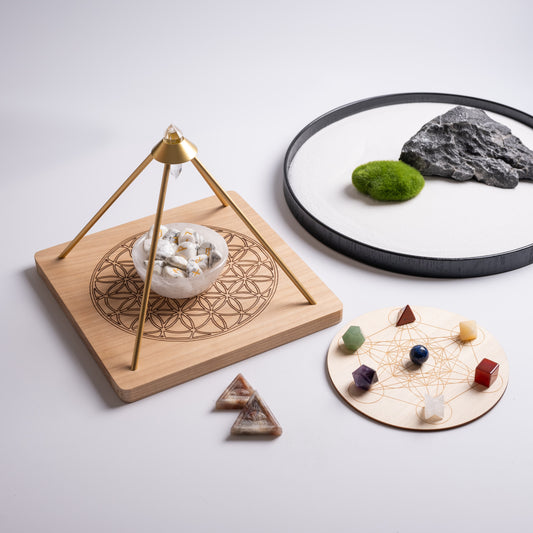 BALANCE collection with crystal runes, selenite bowl, and Flower of Life grid to calm and center your energy.