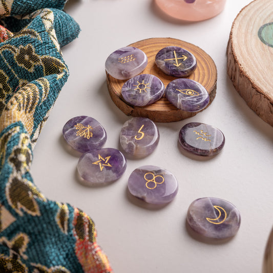 Mystic crystal runes set of 10 on stand, handcrafted amethyst stones with sacred symbols.