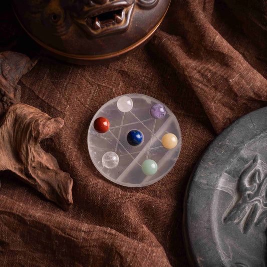 Close-up of polished chakra healing stones with vibrant colors.