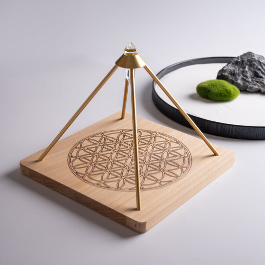 Crystal grid pyramid with Flower of Life wooden base and copper pyramid.