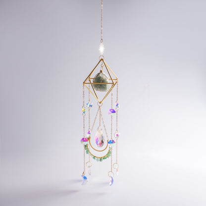 Hanging crystal suncatcher detail showing shimmering crystals and moonstone.