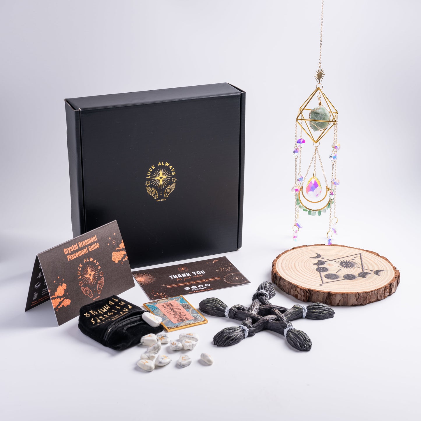 Healing crystal set with chakra stones and protective talismans for wellness and balance.