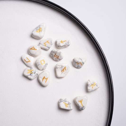 Mystic crystal runes set of 25 white turquoise stones with golden symbols.