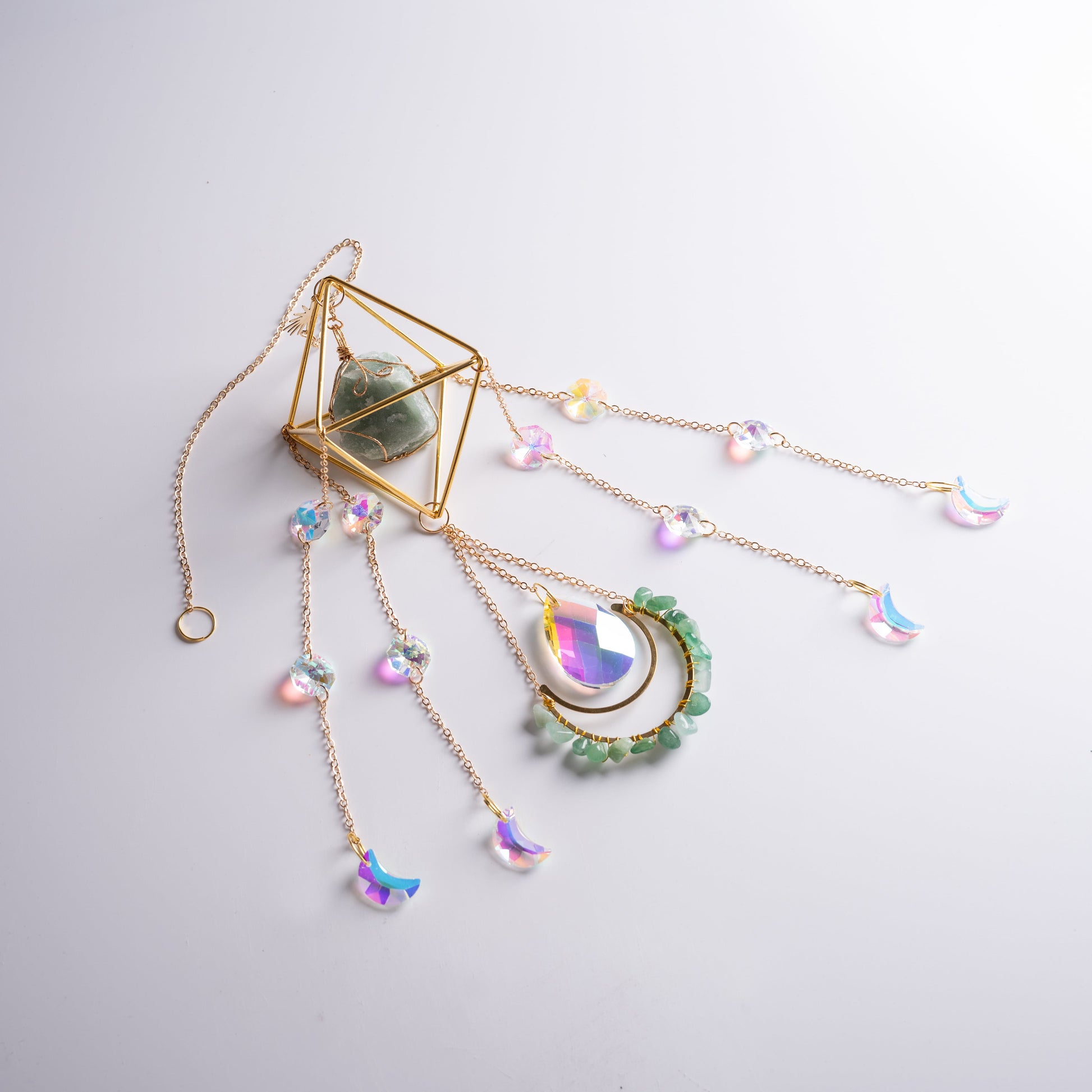 Real crystal suncatcher hanging in sunny window, promoting harmony and health.