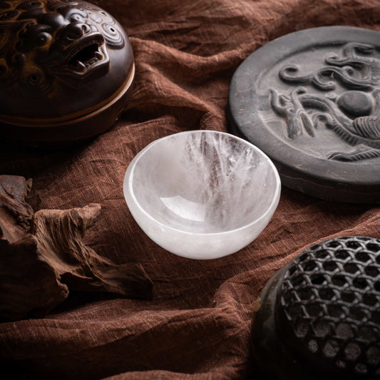 Close-up of polished selenite charging bowl with natural textures.