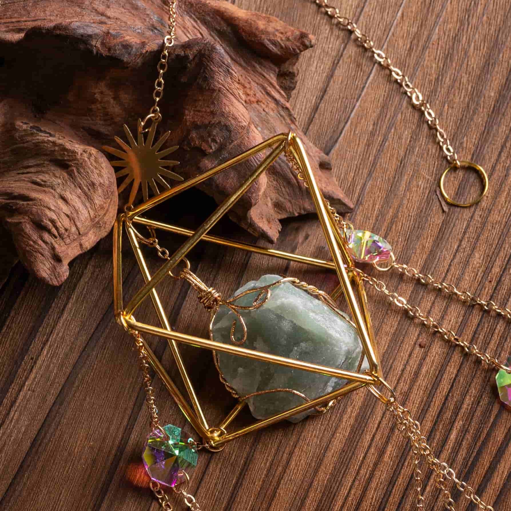 Window suncatcher catching sunlight, casting rainbow light and healing energy.