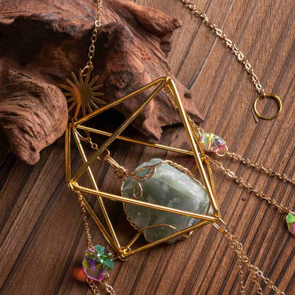 Window suncatcher catching sunlight, casting rainbow light and healing energy.